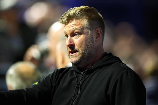 PORTSMOUTH, ENGLAND - OCTOBER 25: Oxford United Manager Karl Robinson looks on at the start of the Sky Bet League One between Portsmouth and Oxford United at Fratton Park on October 25, 2022 in Portsmouth, England. (Photo by Bryn Lennon/Getty Images)