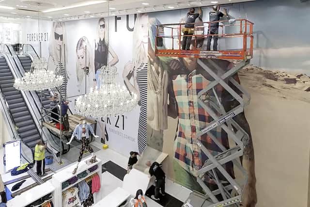 ARC-UK Technologies install prints at a branch of  retail chain Forever 21.