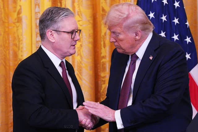 US President Donald Trump and Prime Minister Sir Keir Starmer hold a joint press conference in the East Room at the White House. PIC: Carl Court/PA Wire