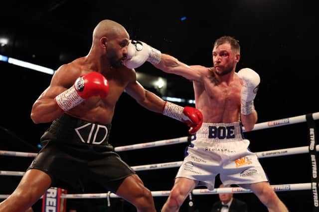 Maxi Hughes punches Kid Galahad during their IBO World Lightweight title fight at Motorpoint Arena Nottingham on September 24, 2022 in Nottingham, England. (Photo by Nathan Stirk/Getty Images)