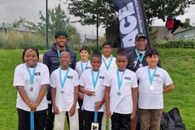 Community game: Andre Jackson and pupils of the ACE cricketing programme in South Yorkshire.