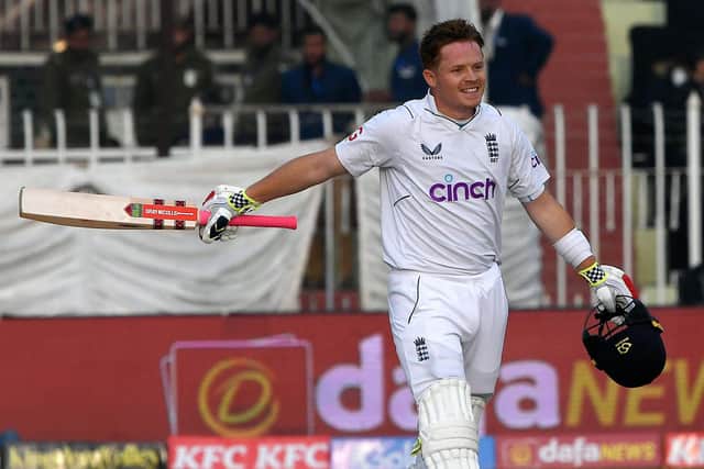 England's Ollie Pope celebrates after scoring a century (100 runs) during the first day of the first cricket Test match between Pakistan and England at the Rawalpindi Cricket Stadium (Picture: AAMIR QURESHI/AFP via Getty Images)
