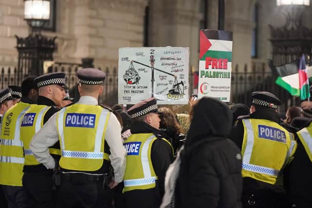 People during a pro-Palestine protest in Whitehall, central London. PIC: Yui Mok/PA Wire