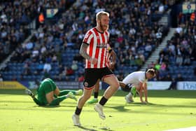 Sheffield United's Oli McBurnie (centre) celebrates scoring his side's second goal of the game during the Sky Bet Championship match at Deepdale Stadium, Preston.Picture: Isaac Parkin/PA Wire.