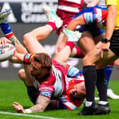EASY PICKINGS: Wigan Warriors Adam Keighran scores in Sunday's rout of Wakefield Trinity. Picture by Olly Hassell/SWpix.com