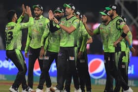 Lahore Qalandars' players celebrate after the dismissal of Multan Sultans' captain Mohammad Rizwan (not pictured) during the Pakistan Super League (PSL) Twenty20 cricket final in March 2023. Lahore and Yorkshire are launching a new talent pathway in the UK (Picture: AAMIR QURESHI/AFP via Getty Images)