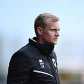 OXFORD, ENGLAND - APRIL 19: Liam Manning, Head Coach of Milton Keynes Dons looks on prior to the Sky Bet League One match between Oxford United and Milton Keynes Dons at Kassam Stadium on April 19, 2022 in Oxford, England. (Photo by Alex Burstow/Getty Images)