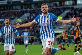 Michal Helik celebrates heading in Huddersfield's opening goal against Hull in January. Helik was named the Terriers' supporters' player of the year (Picture: Bruce Rollinson)