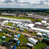 A birds eye view over the one of the biggest agricultural events in the English calendar the Great Yorkshire Show held in Harrogate, North Yorkshire, seen from the top of the Giant Wheel one of the main attraction in the show ground. Picture By Yorkshire Post Photographer,  James Hardisty. Date: 13th July 2023.