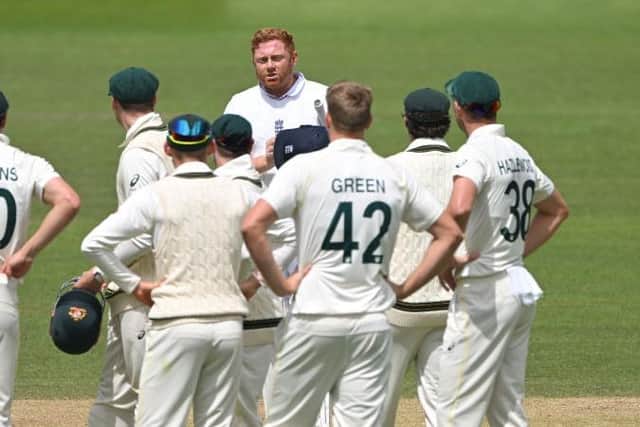 LONDON, ENGLAND - JULY 02: England batsman Jonny Bairstow speaks to the Australia fielders after being given run out during the 5th day of the LV=Insurance Ashes Test Match at Lord's Cricket Ground on July 02, 2023 in London, England. (Photo by Stu Forster/Getty Images)