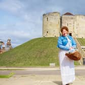 Helen Reynolds in her Regency costume at Clifford's Tower Picture Charlie Kirkpatrick Photography.
