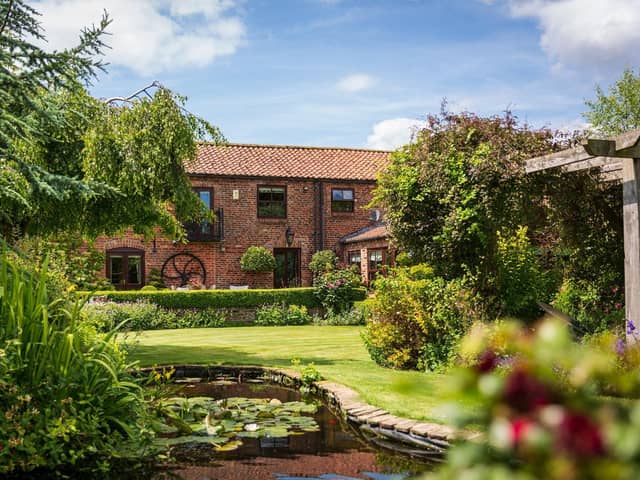 This barn conversion is in the pretty Wolds village of Skerne