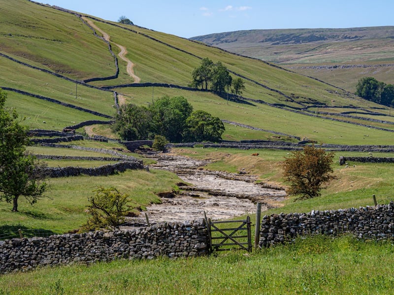 The river dries up every summer during a hot spell as the water flows underground north of Litton, into huge caverns under the riverbed and re-emerges near Arncliffe downstream