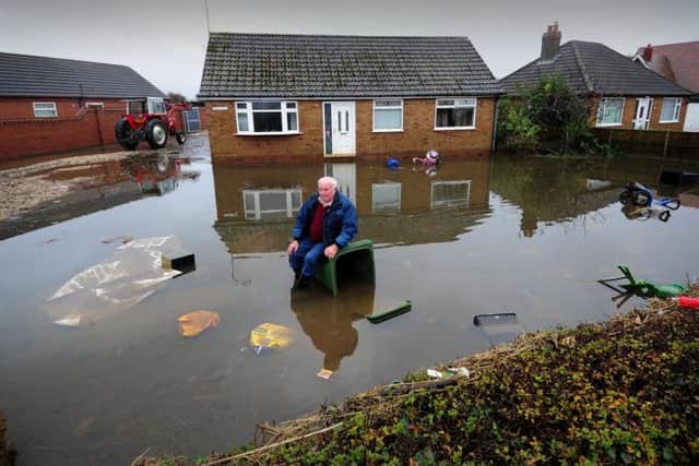Mr Duckitt outside his home, 10 days after the flooding in November Picture: Simon Hulme