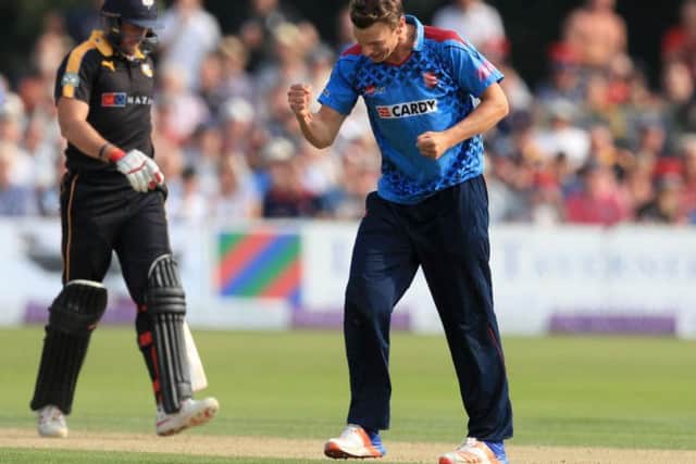 Kent's Will Gidman celebrates taking the wicket of Yorkshire's Tim Bresnan (PA)