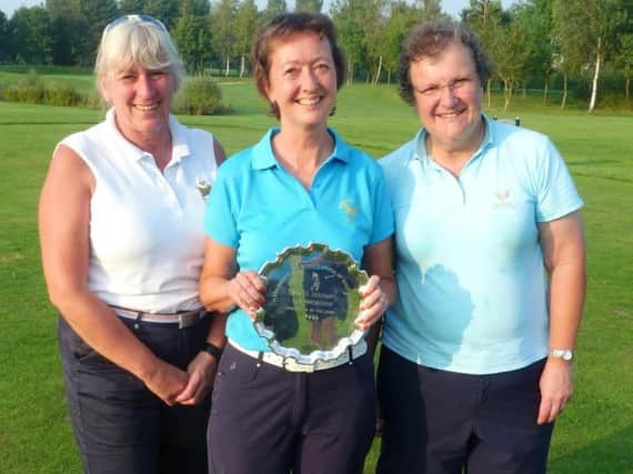 Harrogate & District Union's ladies senior champion Julia Whittington, flanked by Lynda Grey and Karen Leake.