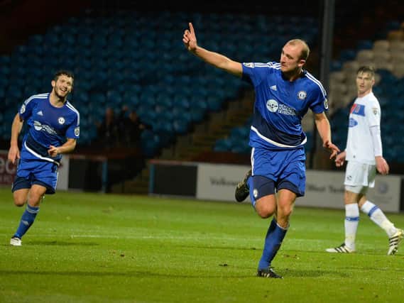 Tom Denton celebrates for FC Halifax Town in the FA Cup win over Dagenham and Redbridge on Tuesday night