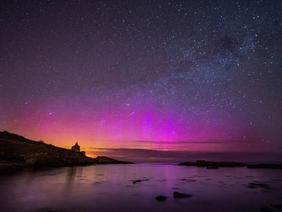 The Northern Lights, or Aurora Borealis, shining over the Bathing House in Howick, Northumberland. (Owen Humphreys/PA Wire)