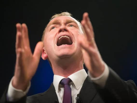 Leader of the Liberal Democrats Tim Farron during his keynote speech where he accused Theresa May of pursuing the same "aggressive nationalistic" agenda as Donald Trump and Vladimir Putin, during the Liberal Democrat spring conference at the Barbican Centre in York. (Danny Lawson/PA Wire)