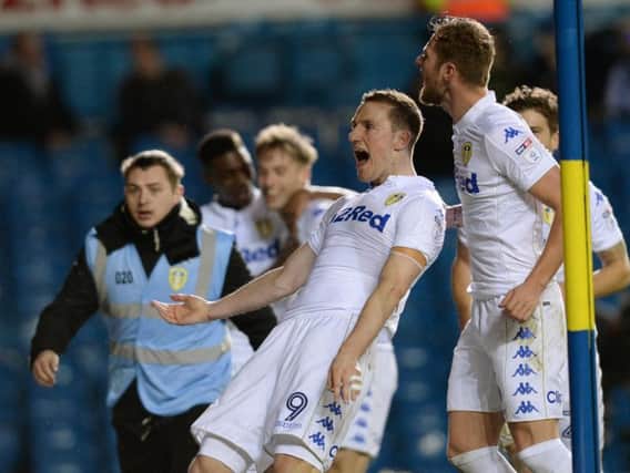 Chris Wood celebrates scoring for Leeds against Brighton