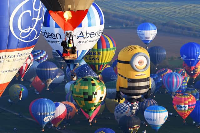 Some of the 100 balloons taking part in a World Record attempt for a mass hot air balloon crossing of the English Channel, set off from Dover in Kent.
