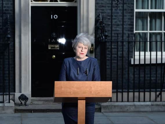 Theresa May making the announcement outside 10 Downing Street