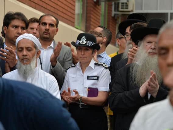 Metropolitan Police Commissioner Cressida Dick joins members of the public as they gather close to Finsbury Park Mosque in north London, after a van was driven into pedestrians near the north London mosque, leaving one man dead and eight injured. Picture: John Stillwell/PA Wire