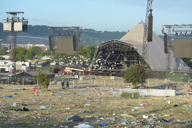 Rubbish is collected following the Glastonbury Festival at Worthy Farm in Pilton, Somerset.
