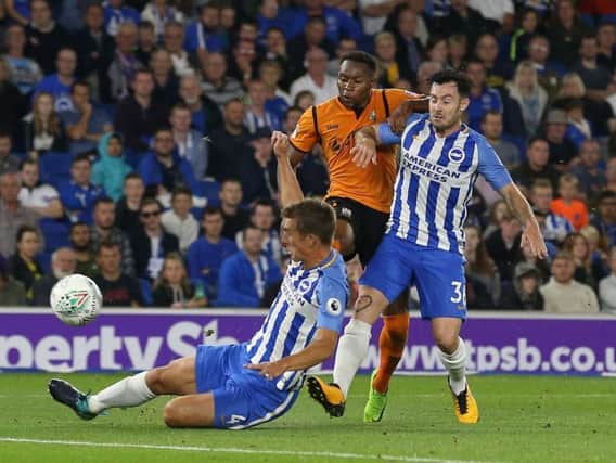 Richie Towell, right, in action for Brighton and Hove Albion (Photo: PA)