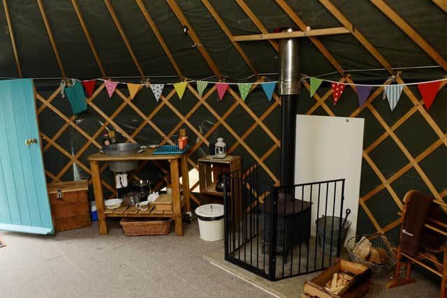 Visitors have a choice of nestling down in a secluded tree lodge or a snug meadow yurt at Swinton Bivouac
