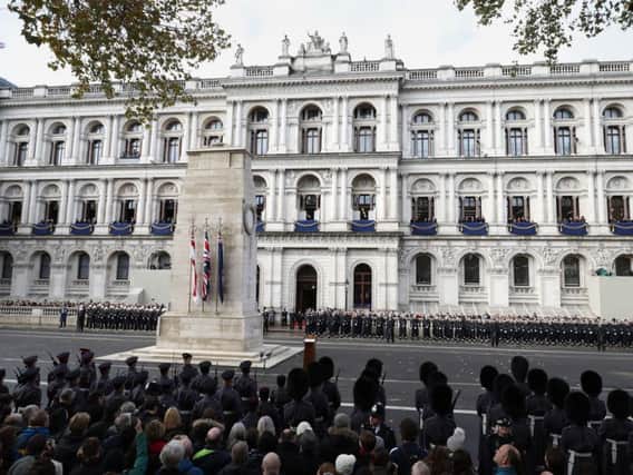 Military officials line-up at the Cenotaph during the remembrance service in Whitehall, central London, on the 100th anniversary of the signing of the Armistice which marked the end of the First World War.