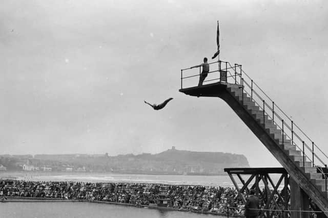 Crowds watching the platform diving at Scarborough.