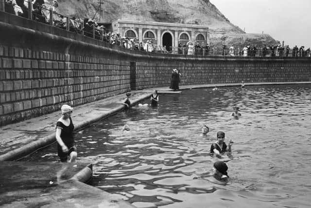 Bathers at the swimming pool at South Cliff.
