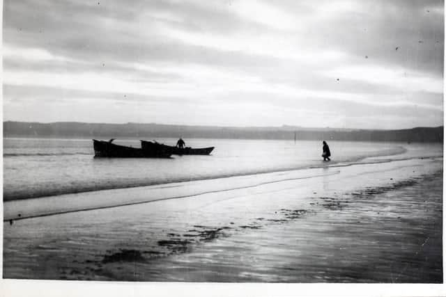 Fishing boat on the shore at Filey.