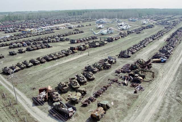 A 'graveyard' of contaminated military vehicles, including helicopters