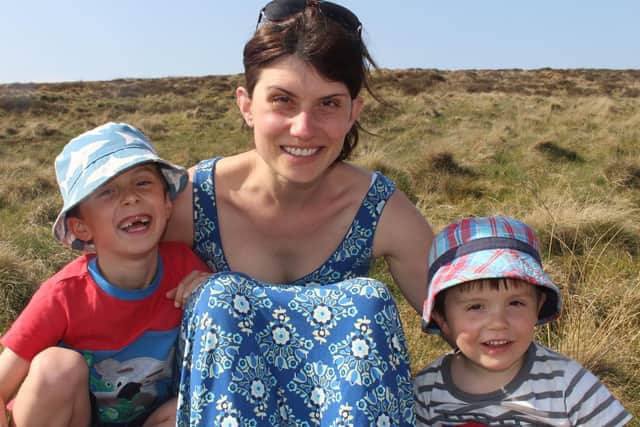 Sam Tuckett with mother Louise, 36, and brother Oscar, 6.