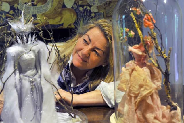 Carolyn van Outerstorp inside the on-site fairy museum
