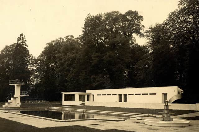 The Art Deco poolhouse, diving board and pool