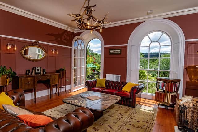 The sitting room is full of original Georgian features, along with vintage and antique finds
