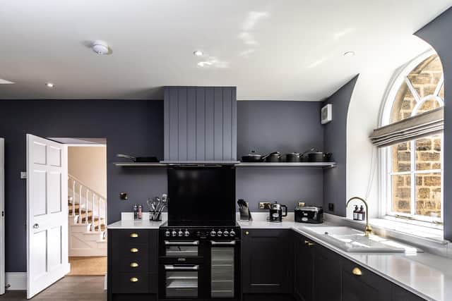 The new kitchen is big enough for a professional chef to cook a meal for guests
