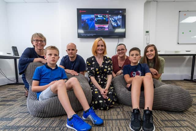 Oliver and Louis had a chance to get to know each other and play video games together. Pictured centre is Martha Currie, who established Mable Therapy in 2015.