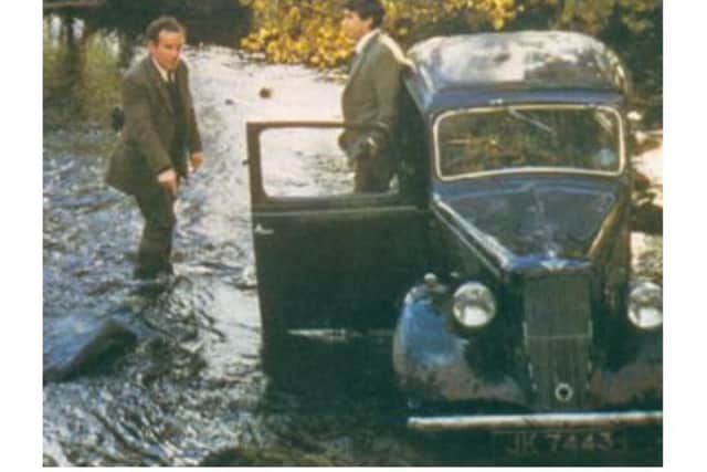 The 'water splash' scene in It Shouldn't Happen to a Vet, with the Austin car.