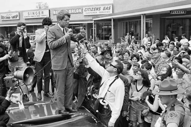 Democrat presidential candidate Bobby Kennedy speaks to a crowd of his supporters during a campaign stop. (Photo by Â© Wally McNamee/CORBIS/Corbis via Getty Images)