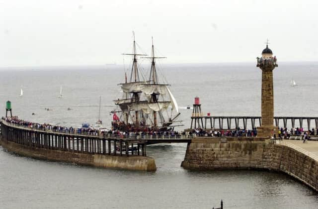 The first Endeavour arrives at Whitby harbour on a return visit in 2002.