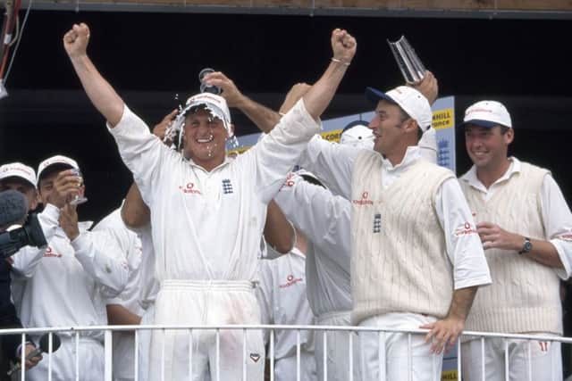 Champagne moment: Darren Gough celebrates as team-mate Nasser Hussain pours a glass of bubbly over his head. Picture: David Munden/Popperfoto/Getty Images
