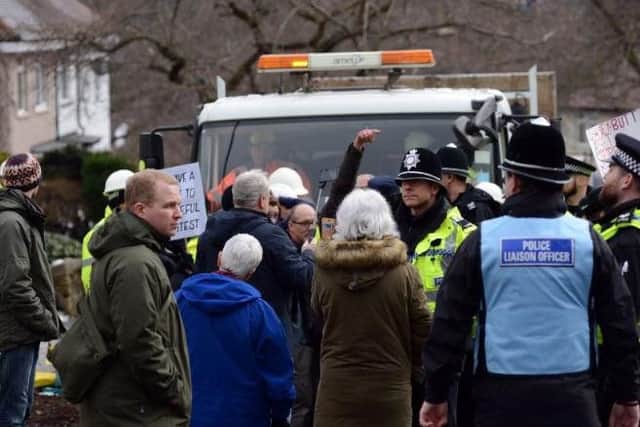 Protesters and police on Abbeydale Park Rise in Dore.