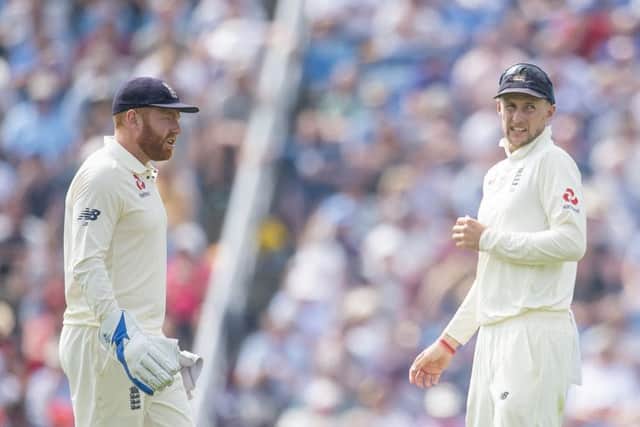 England's Jonny Bairstow and Joe Root confer in the middle on day one at Headingley Picture by Allan McKenzie/SWpix.com