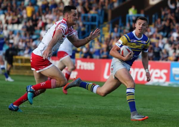 Jack Walker runs in a try for Leeds Rhinos as they beat Leigh Centurions (Picture: Tom Banks/Varleys).