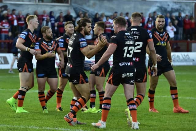 Castleford Tigers' Alex Foster celebrates scoring his side's third try against Hull KR on Friday night. Picture: Matthew Merrick/RL Photos