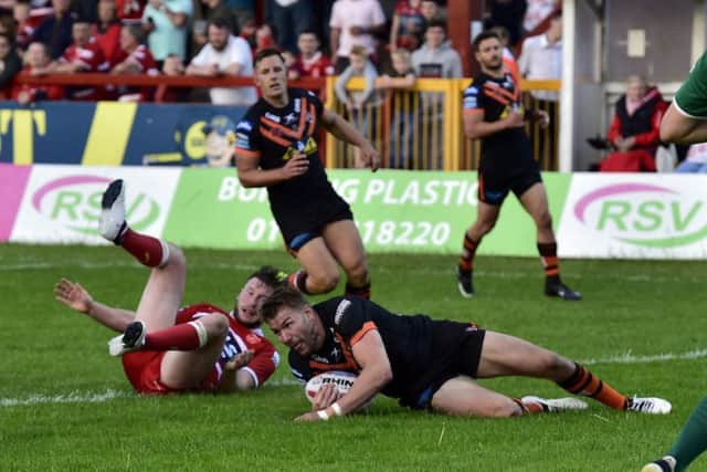 RAMPANT: Castleford Tigers' Michael Shenton goes over for try No 5 against Hull KR. Picture: Matthew Merrick/ RL Photos